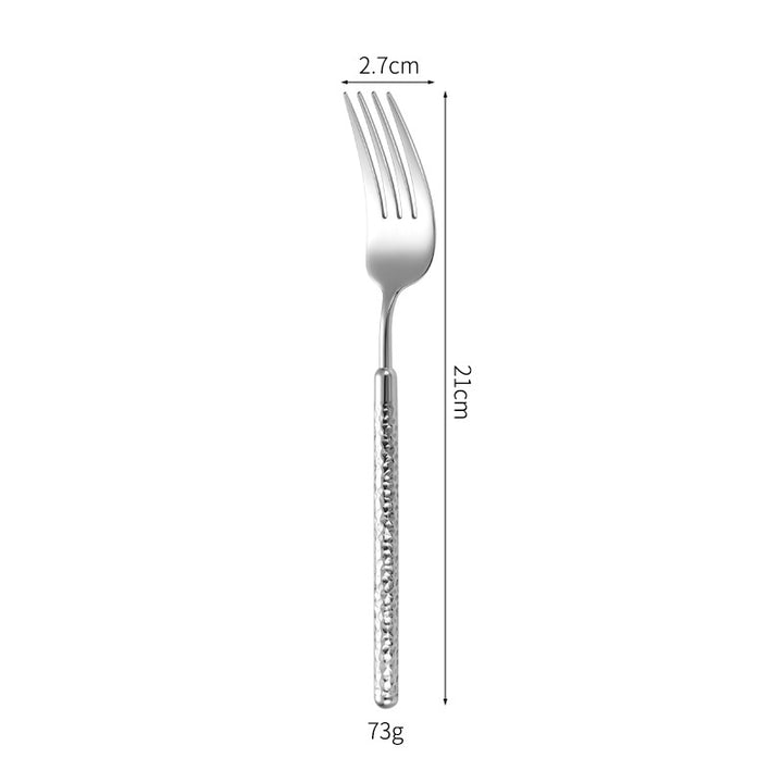 Elegant dessert spoon with elaborate handle design Kalsten