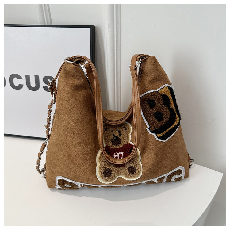 Shoulder bag in playful bear pattern Kalsten