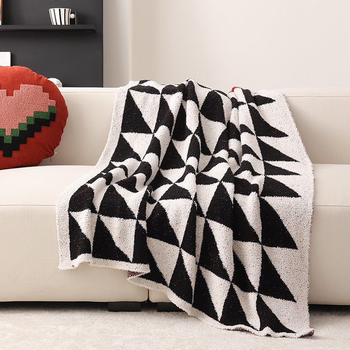 Coarsely woven decorative blanket with geometric jacquard pattern and soft bouclé Kalsten