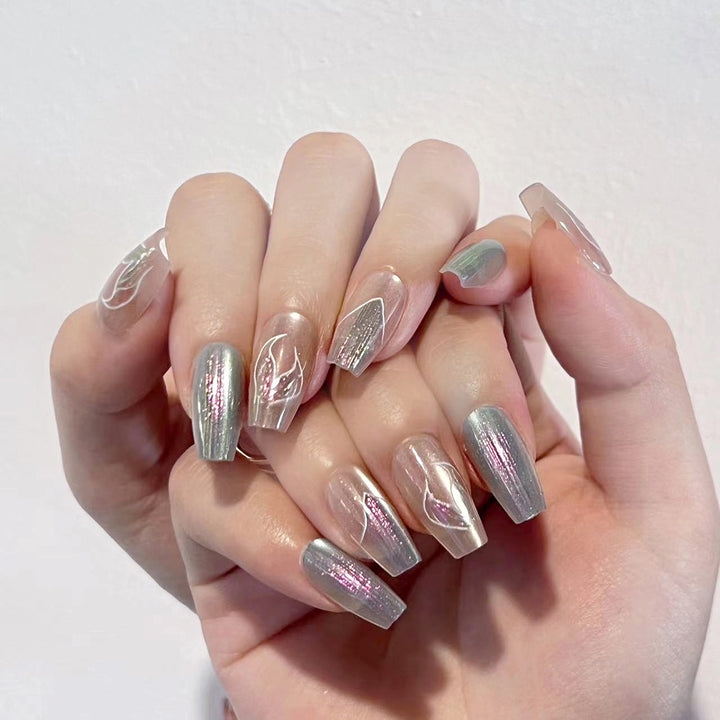 Artful artificial nails with transparent color gradient and delicate floral designs Kalsten