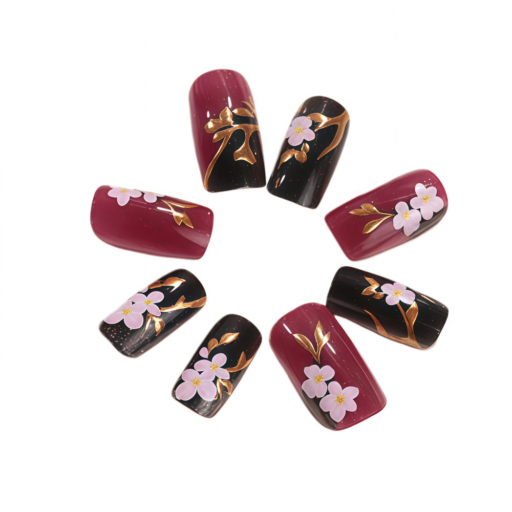 Artificial nails with elegant floral accents Kalsten