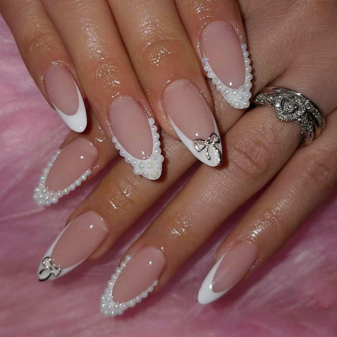 Elegant Pearl-Accentuated Stiletto Nail Art Kalsten