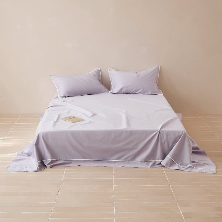Noble cotton satin bed sheet and pillowcase set with fine piping