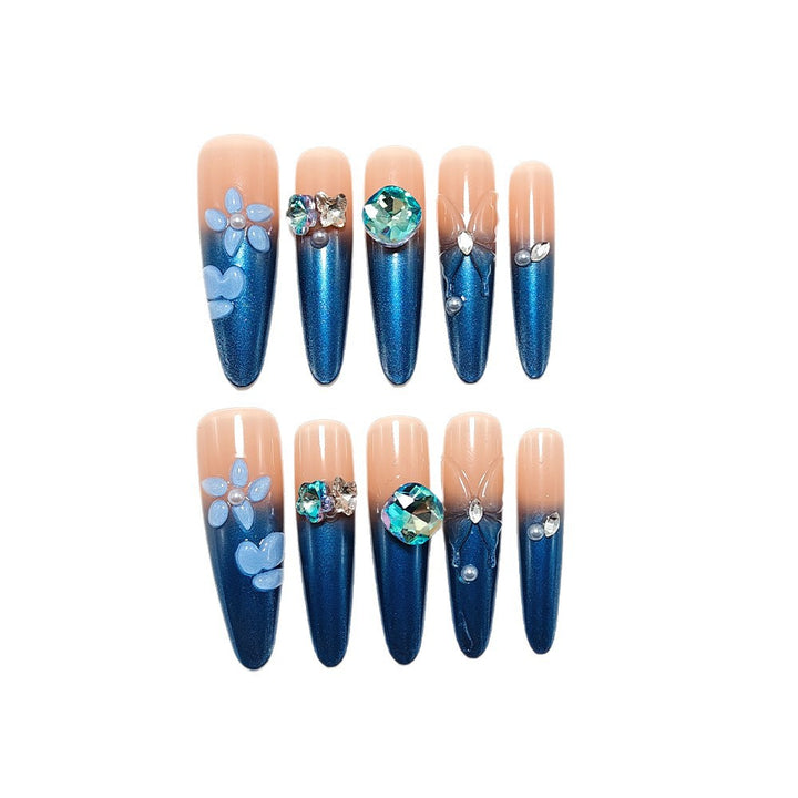Artificial nails in elegant design with artistic decorations and glitter accents Kalsten
