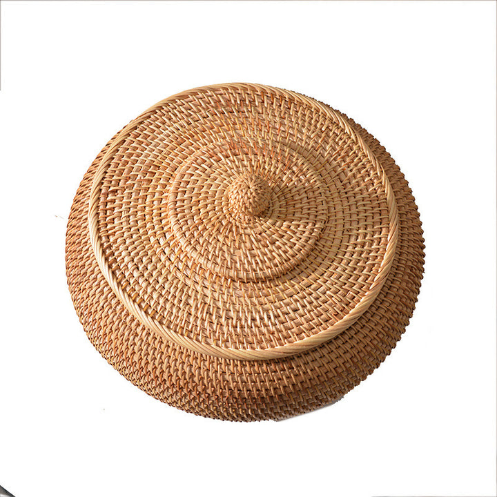 Women's round storage basket made of woven natural material Kalsten