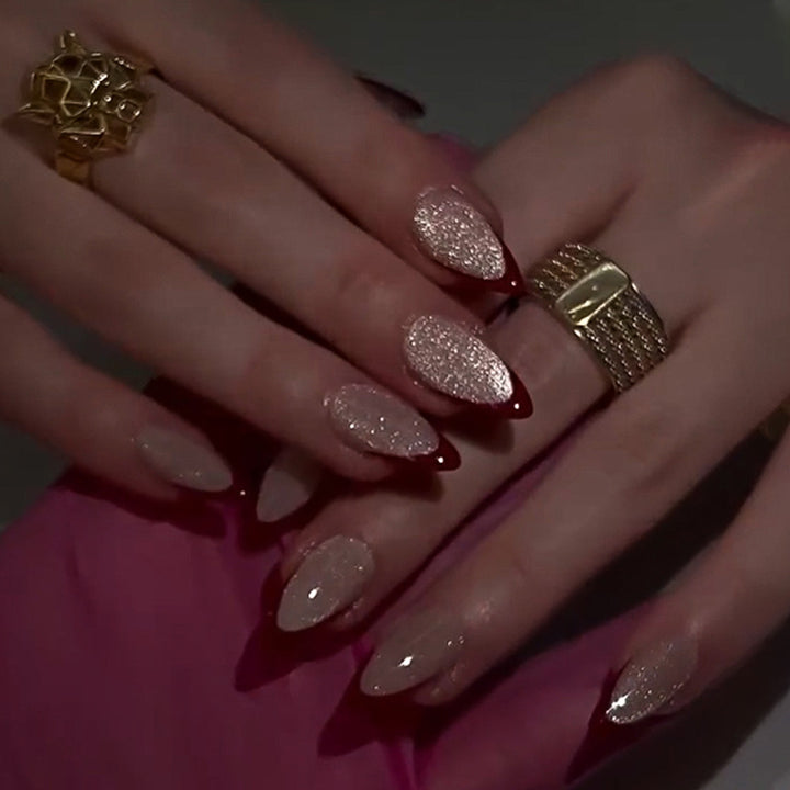 Artificial stiletto nails with sparkling tips Kalsten