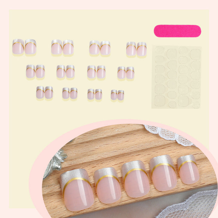 Artificial nail creations with elegant gold trim Kalsten