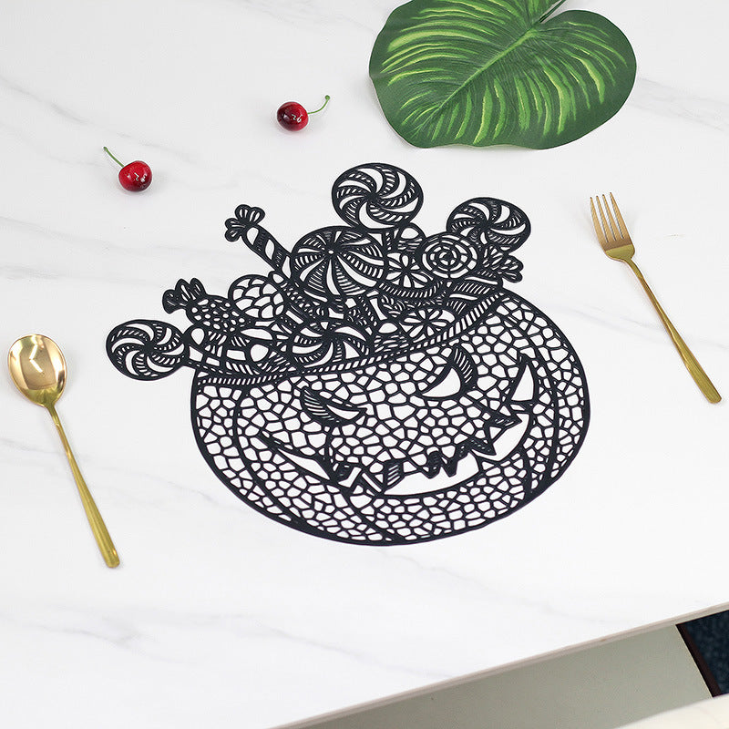 Filigree laser-cut pumpkin placemat made of wood for Halloween table decoration