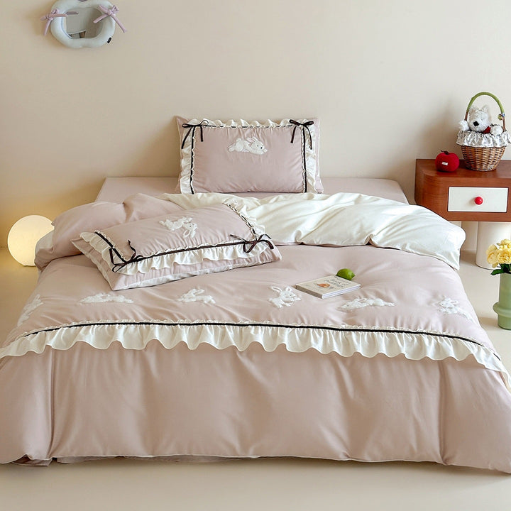 Romantic duvet cover set with embroidered bunnies, ruffled edge and reversible function