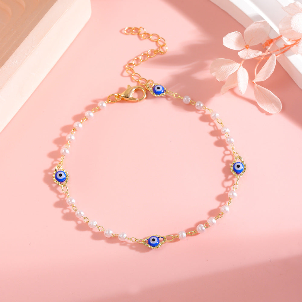 Elegant Pearl and Eye Charm Necklace Kalsten
