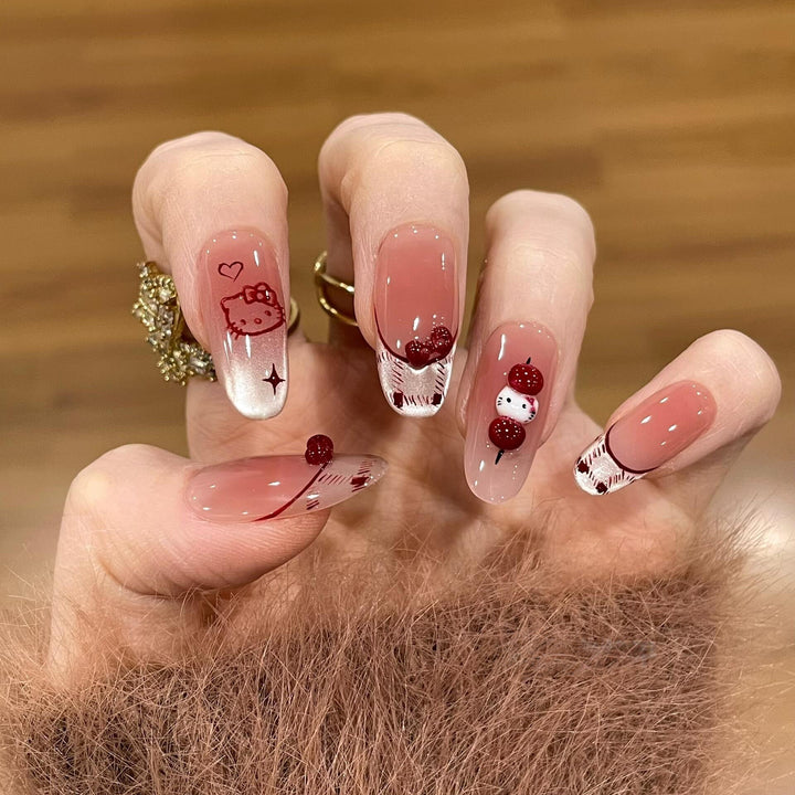 Artificial nails with playful Hello Kitty design Kalsten