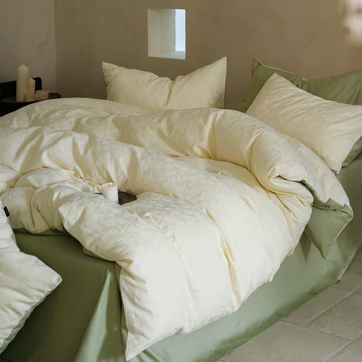 Fine woven bedding set made of cotton satin with subtle jacquard flower texture