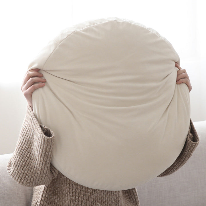 Round seat pouf with soft velvet cover, removable zipper, and shape-stable filling Kalsten