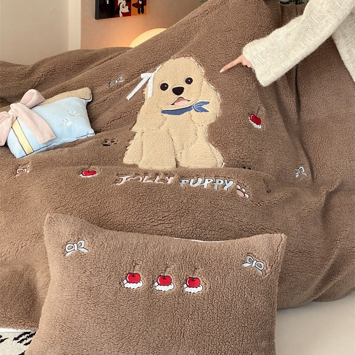 Plush bedding set with Sherpa finish, quilted cozy blanket, and embroidered puppy motif Kalsten