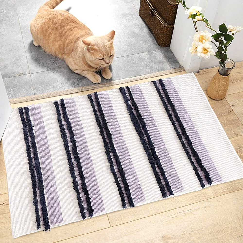 Cotton bath mat with textured stripes and fringes Kalsten