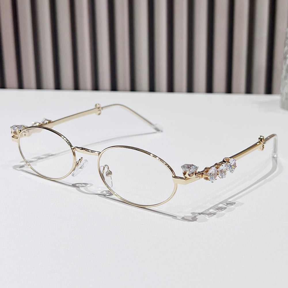 Fashion-Forward Oval Sunglasses with Crystal Accents Kalsten