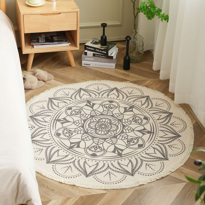 Round woven rug with mandala motif, flat cotton-jute mix and fringes Kalsten