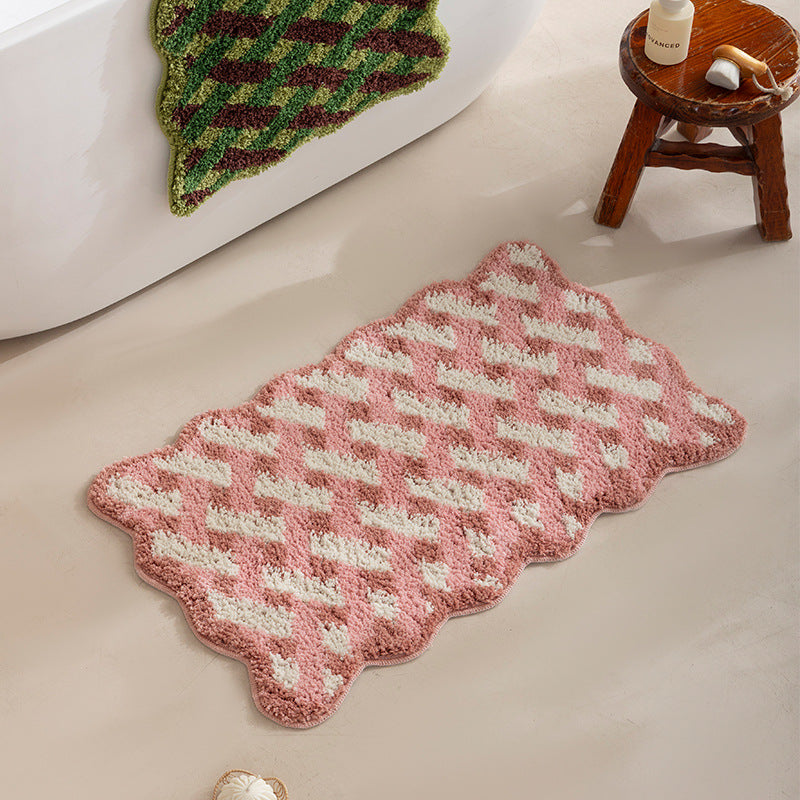 Tufted bathroom runner with wavy hem and relief-style braided pattern Kalsten