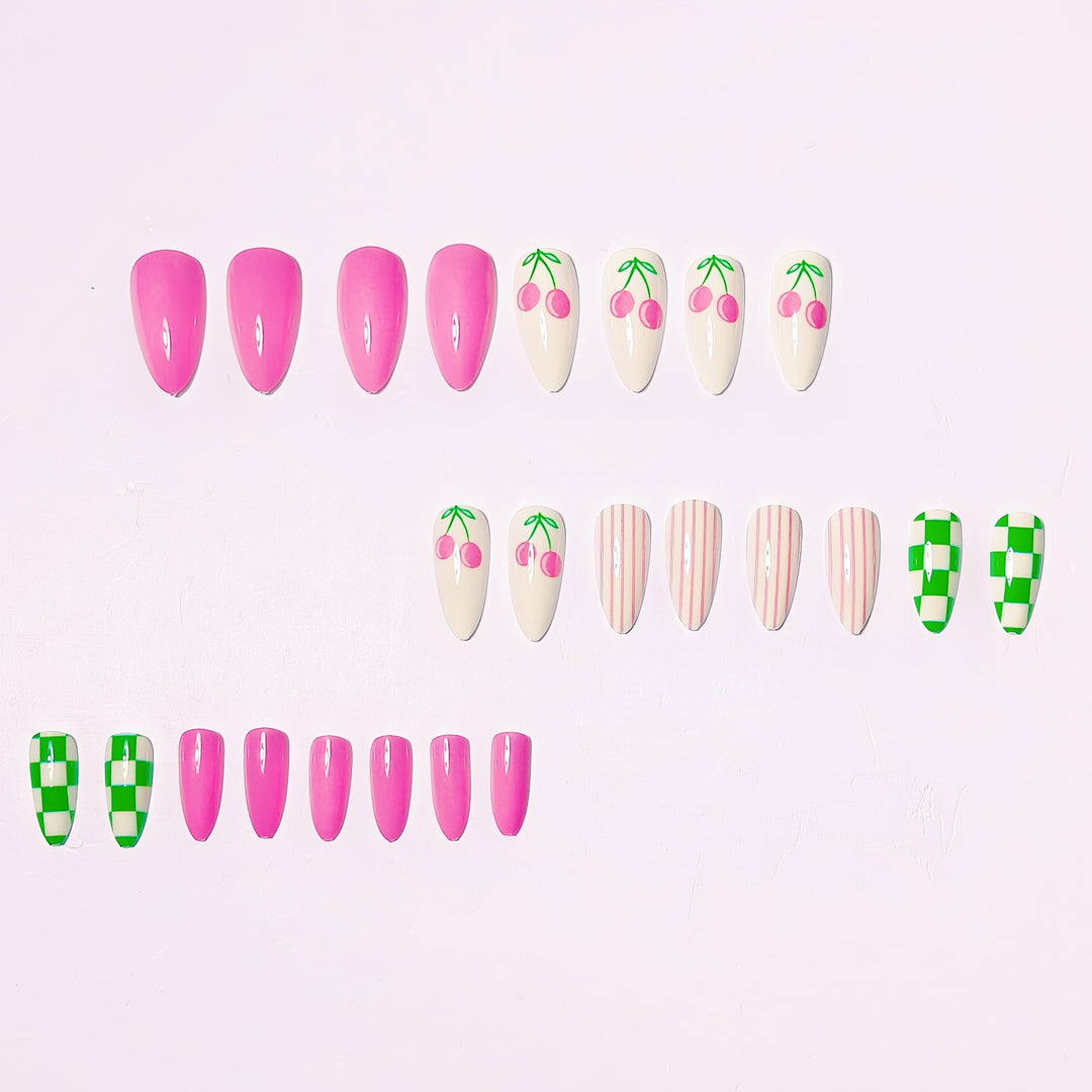 Artificial nails with fruity cherry design and striking colors Kalsten
