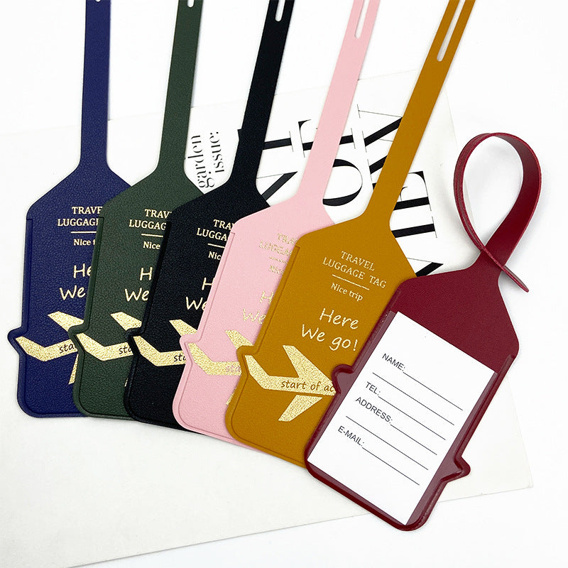 premium leather travel luggage ID tag with embossed airplane motif and adjustable strap Kalsten