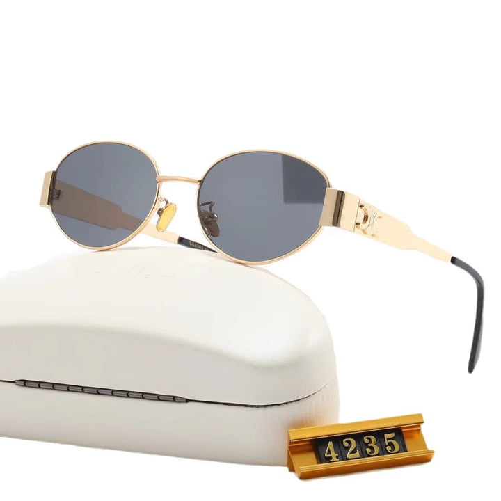 Women elegant oval sunglasses with gold-colored frame Kalsten