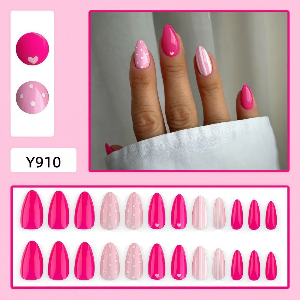 Artificial nails in playful design with hearts and dots Kalsten