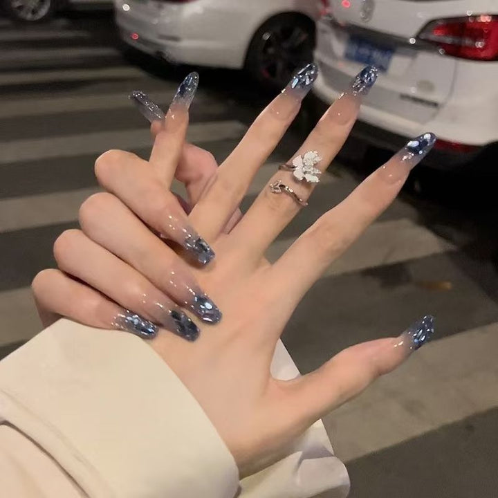 Artistic nail tips with playful motifs Kalsten