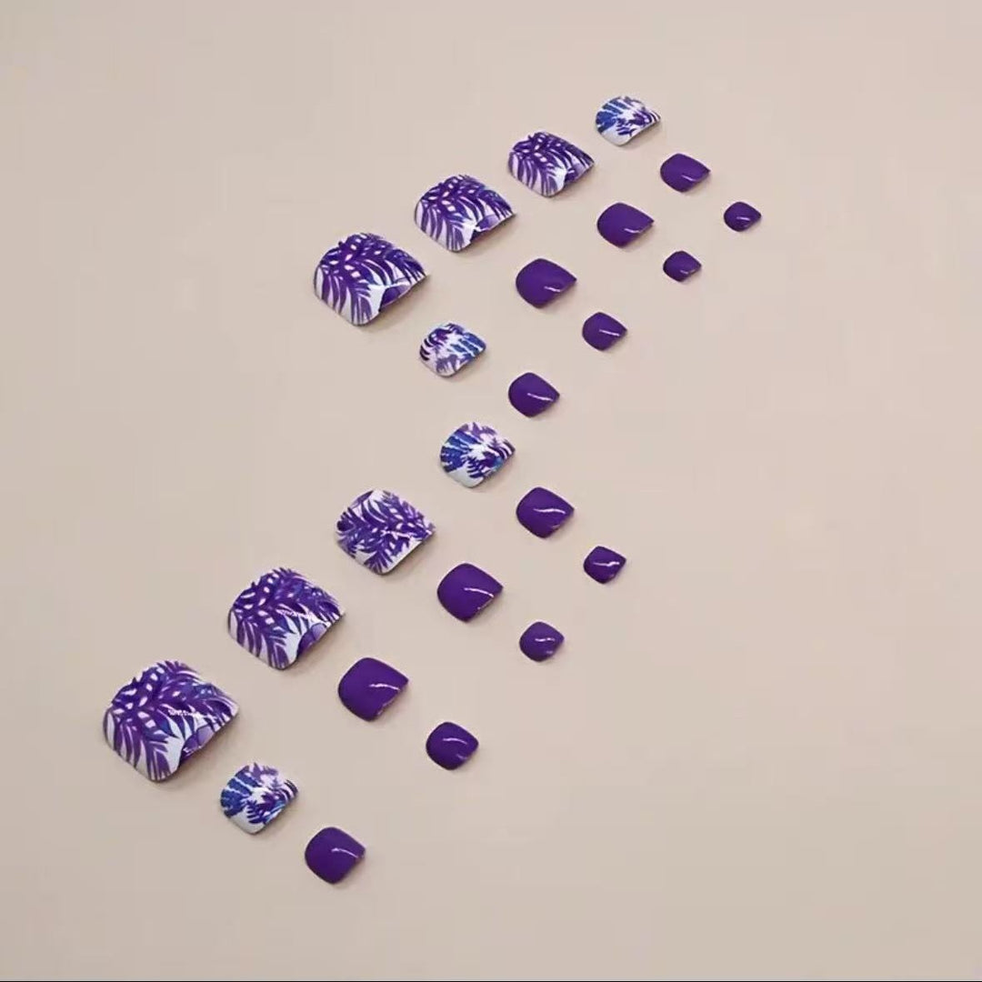 Nail art set with vibrant tropical motifs and glossy finish Kalsten