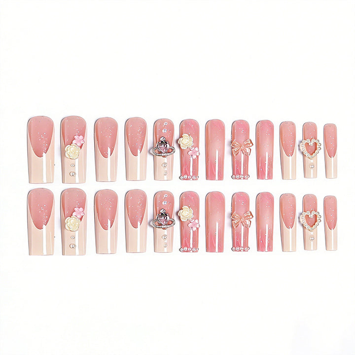 Artful nail tips with pearl and bow motifs Kalsten
