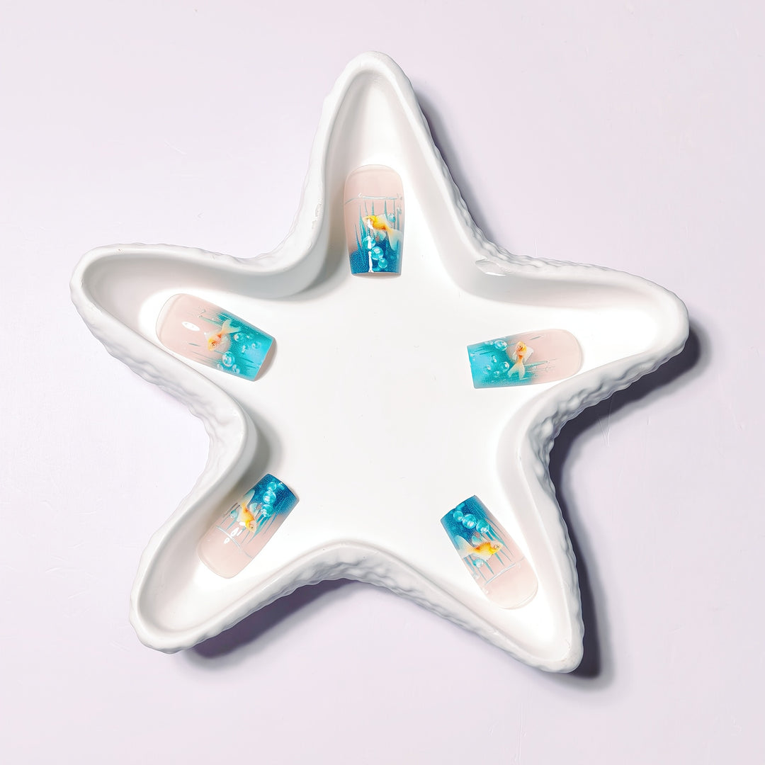 Creative art nails with maritime goldfish design Kalsten