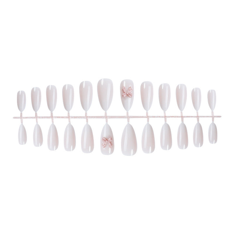 Elegant artificial nail set with luxurious ombre effect and delicate bow accents Kalsten