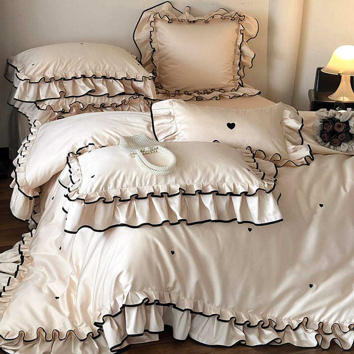 Cotton satin bed set with double-layer ruffled trim, contrast edge and heart embroidery