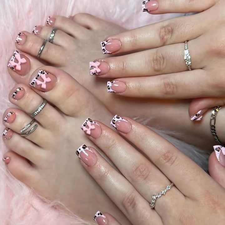 Artificial nail set with impressive floral and bow accents Kalsten