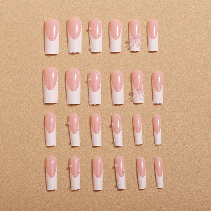 Artistic nail extensions with pearls and bows decorations Kalsten