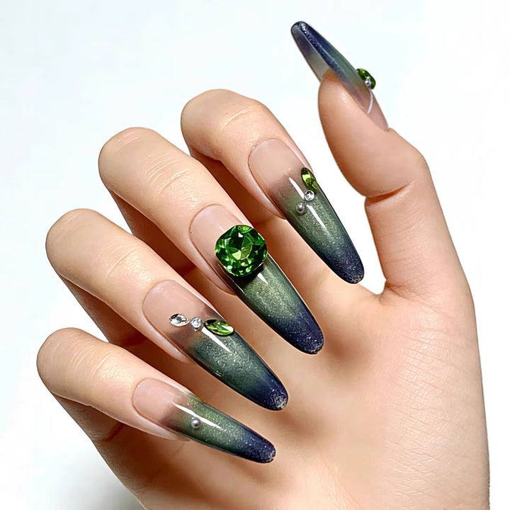 Artificial nails with elegant ombre design and rhinestone applications Kalsten