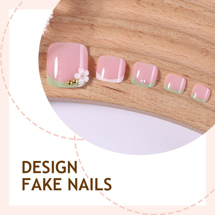 Nail art set with delicate flower designs and glossy finish Kalsten