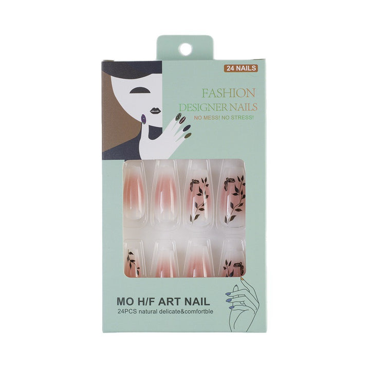 Press-on nails in elegant ombre design with floral accents Kalsten