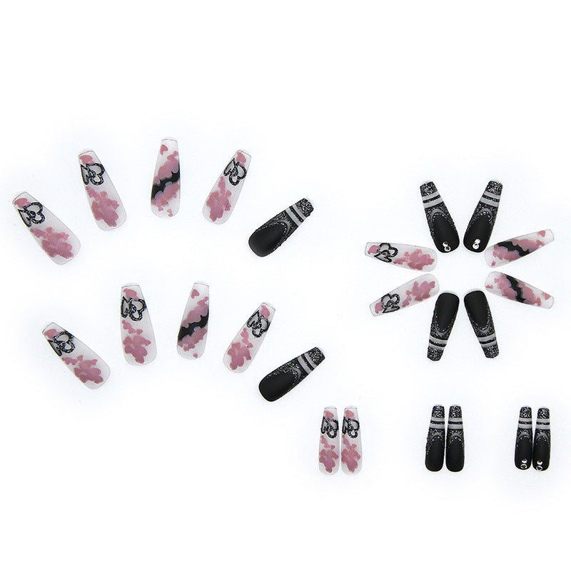 Artificial nail set with creative 3D elements and sparkling accents Kalsten