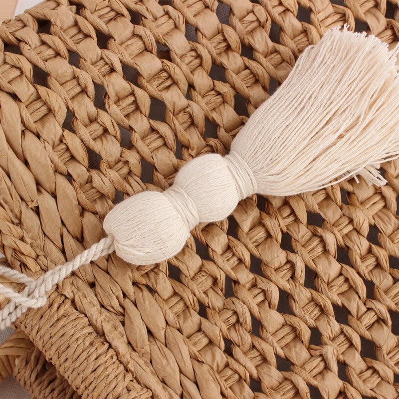 Basket bag with decorative tassel embellishment Kalsten