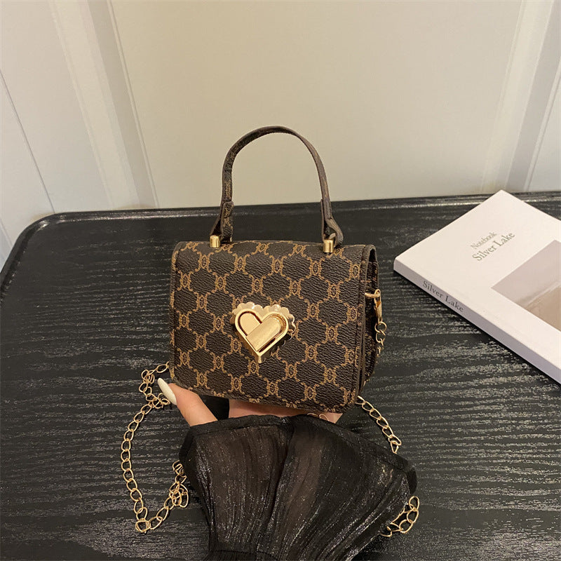 Elegant Heart-Embellished Handbag