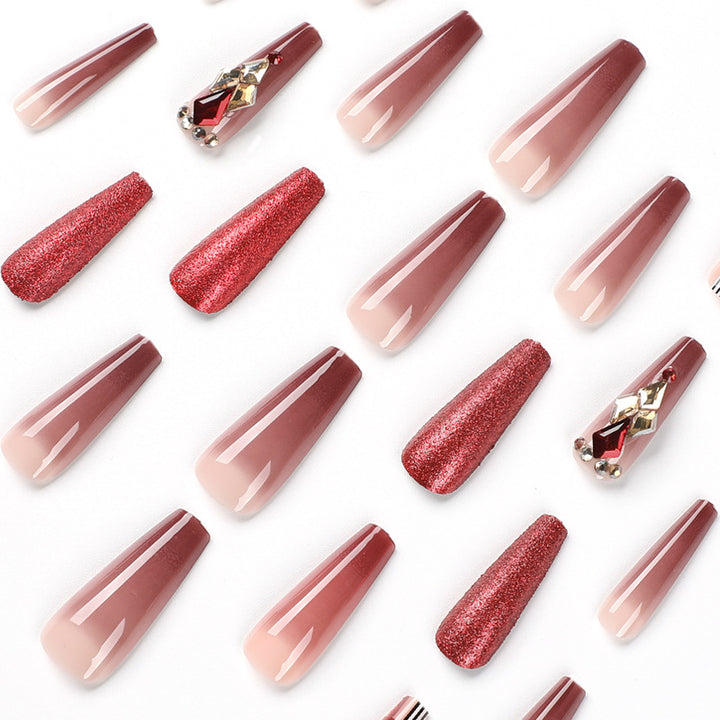 Glamorous stiletto nails with extravagant design and glitter accents Kalsten