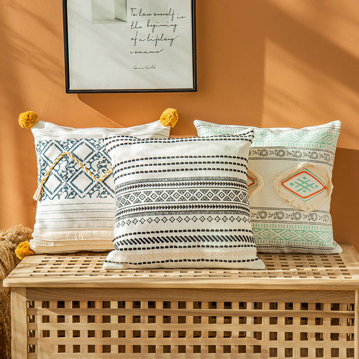 Woven decorative cushion cover in ethnic mix with braided ribbon and tassels Kalsten