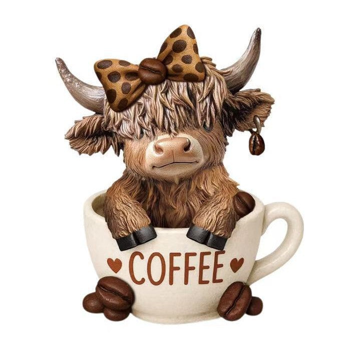 Decorative figure of a Highland cow with accessories Kalsten