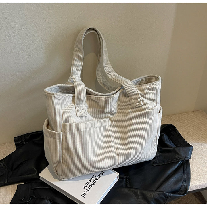 Multifunctional shoulder bag with large outer pockets Kalsten