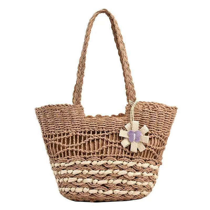 Handwoven beach bag with floral accents Kalsten