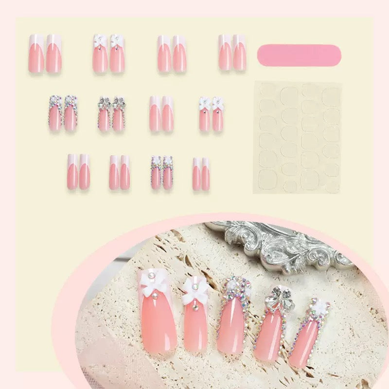 Artificial nail set with shimmering rhinestone decorations and floral design Kalsten