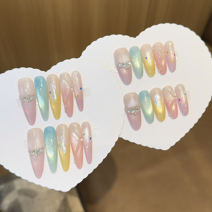 Artificial nails with shimmering effects and sparkling rhinestone details Kalsten
