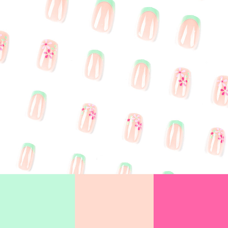 Artificial nails with floral accents and neon tips Kalsten