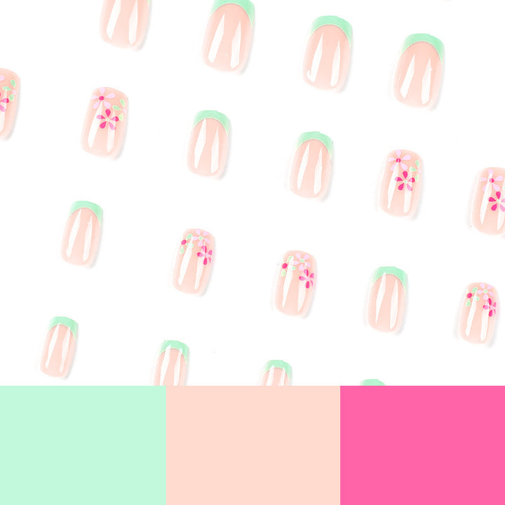 Artificial nails with floral accents and neon tips Kalsten