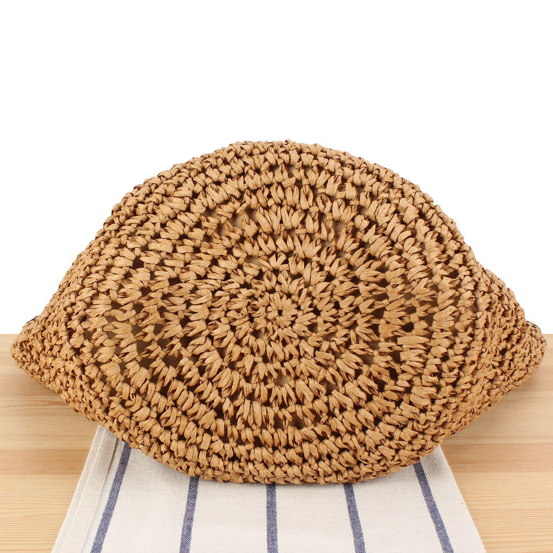 Beach shoulder bag made of handwoven natural material with comfortable carrying handles Kalsten